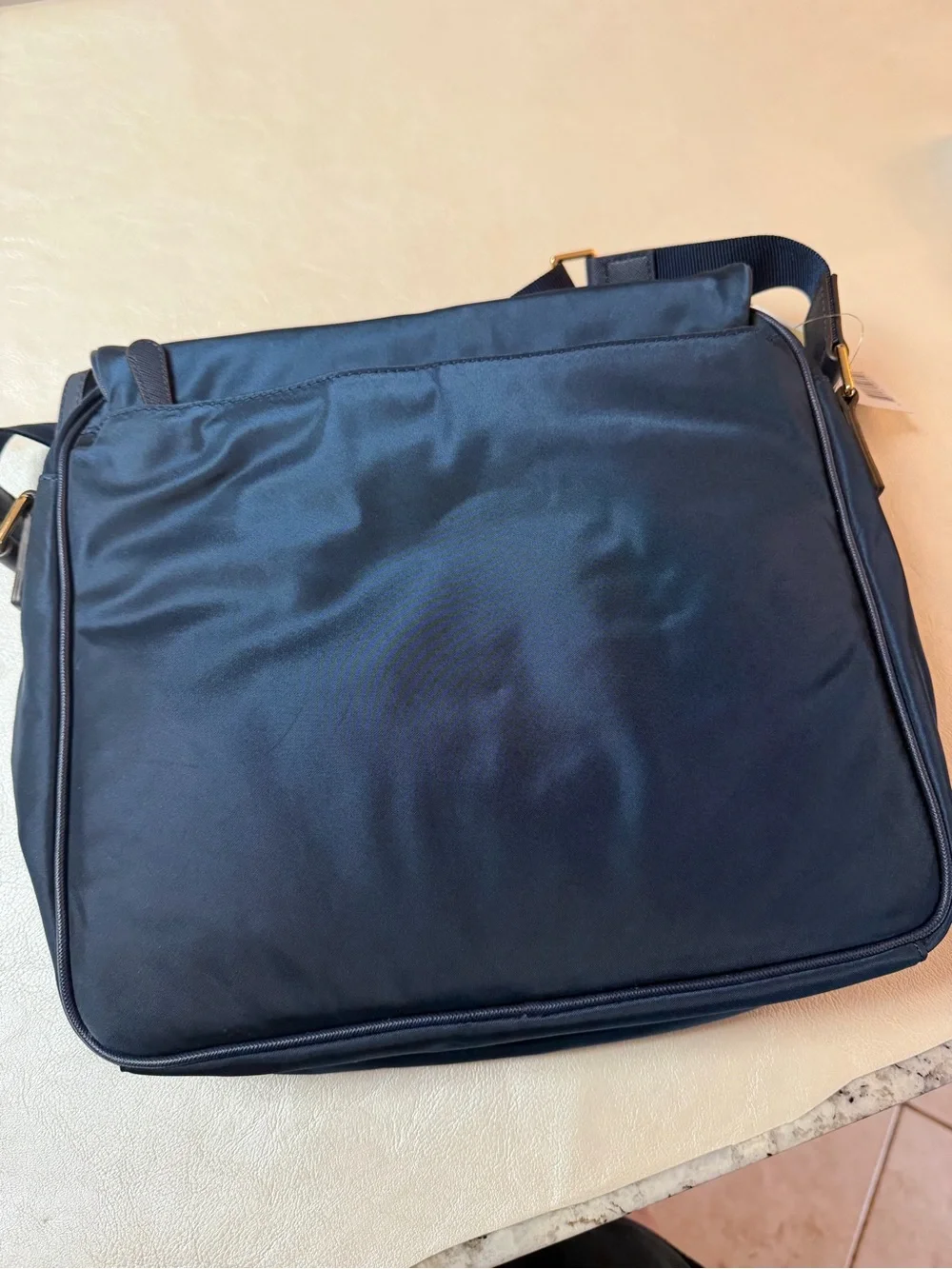 Michael Kors Navy Messenger Bag with Gold Logo